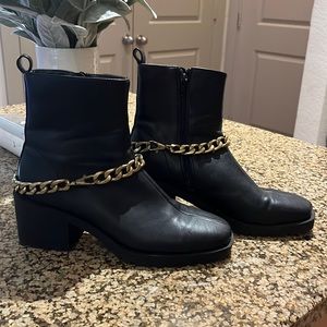 Black ankle boots by Shu Shop